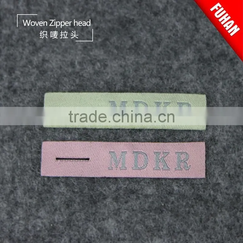 Double-sided woven zipper puller