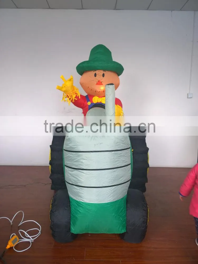 Animated Inflatable Farmer/Peasant Toy on Green Tractor with Yellow Wheels