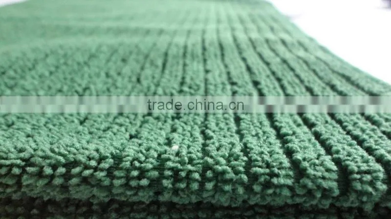 Warp knitted stripe cleaning material