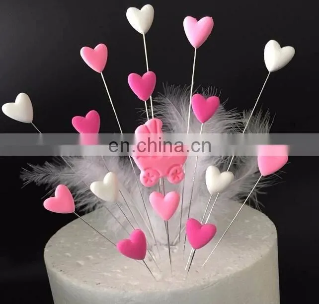 Unique Design Baby Birthday Party Decoration Clay Baby Carriage Heart Shaped With Feather Cake Topper