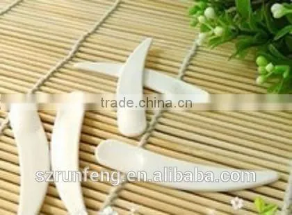 Small plastic spoon