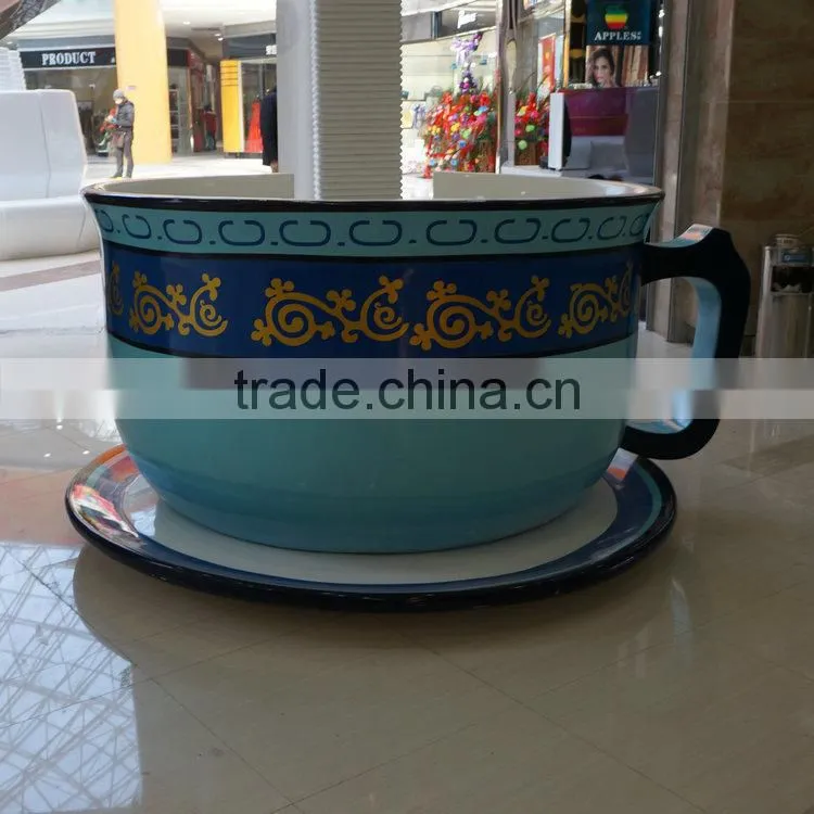 Large fiberglass coffee cup chair