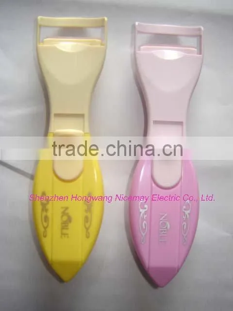 mini eye lash curler with color-changing indicator