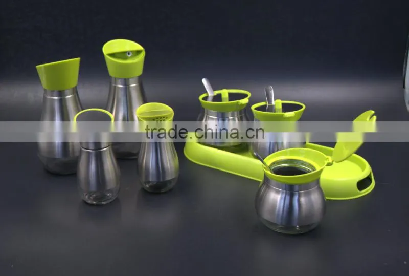 glass spice jar set on plastic base
