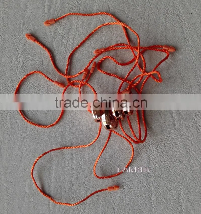 Gold string seal tag for working wear