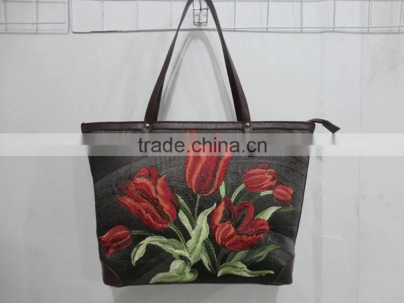 embroidery front with lether back and belt lady bag