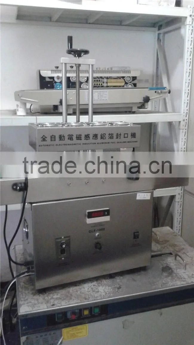 Automatic aluminum foil cap sealing machine with best price