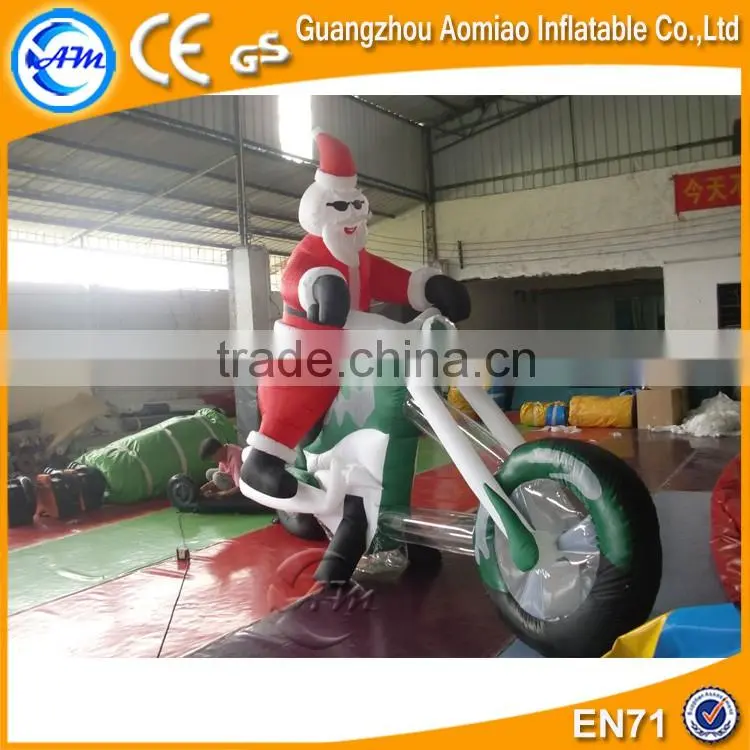 inflatable santa with car, inflatable santa on motorcycle