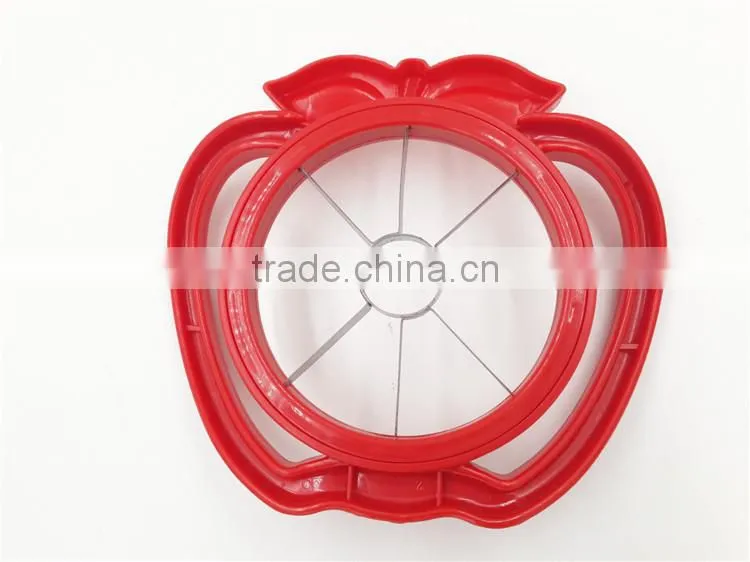 Plastic apple corer and apple slicer