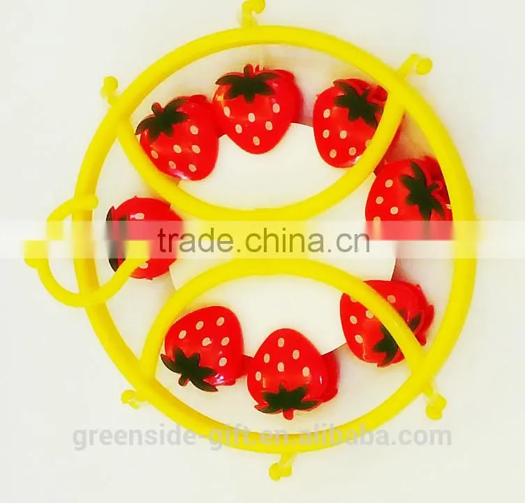 Durable plastic sock hanger with cartoon strawberry pegs