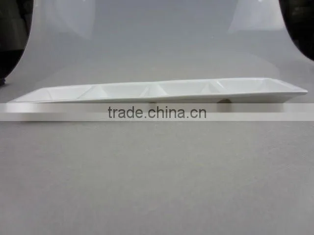 Stock white porcelain four division sauce dish