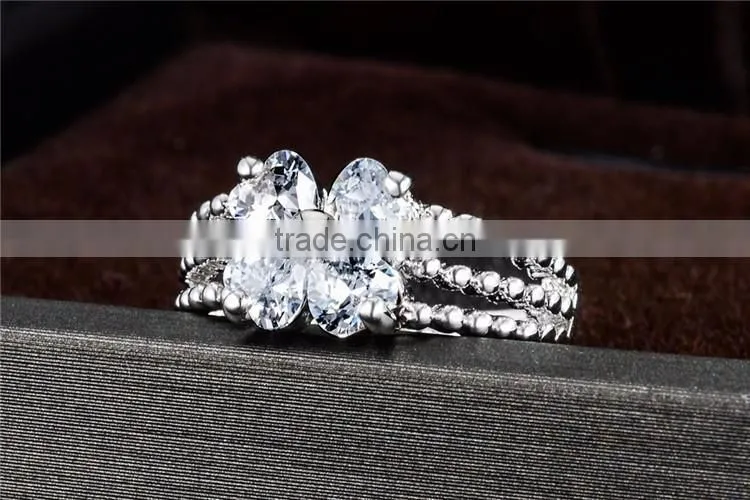 Wholesale alibaba fashion jewelry gold/silver clear crystal luxury wedding piston ring
