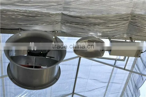 Greenhouse cooling pad and fan
