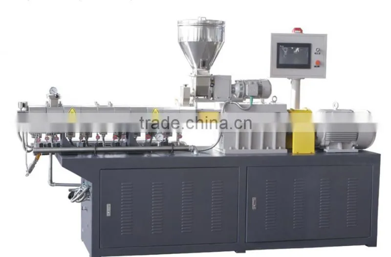 rotating helical auger conveyor to move granular materials