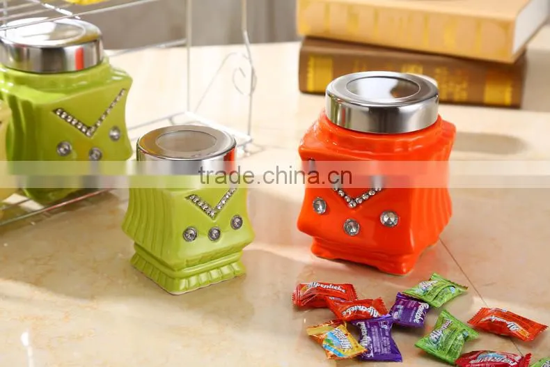 ceramic storage jar with metal stand