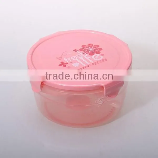 Household pink round four locked lunch box with spoon