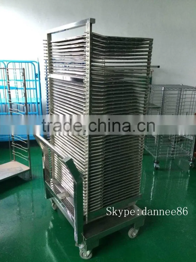 Stainless steel industrial drying rack into hot oven