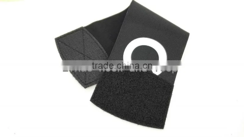 Hook and loop armband with logo