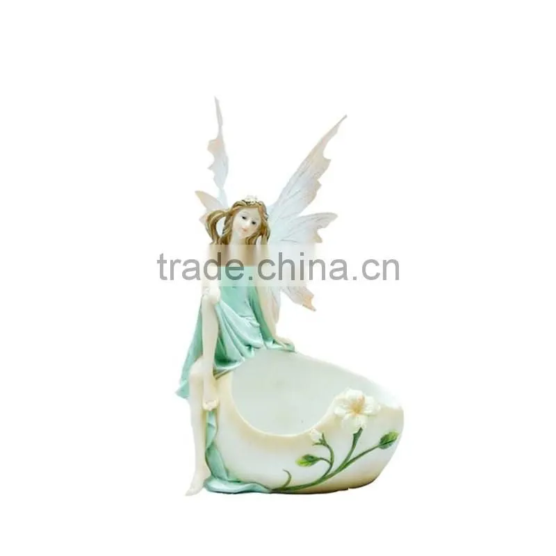 polyresin fairy sitting