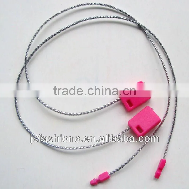plastic tag with silver shiny string
