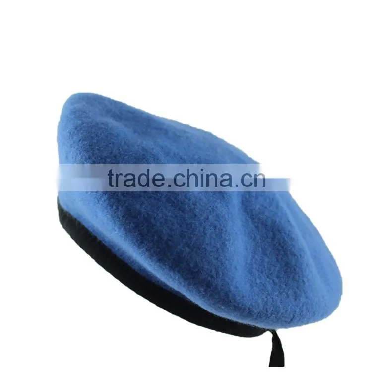 Blue military wool beret with metal eyelets and knitted band
