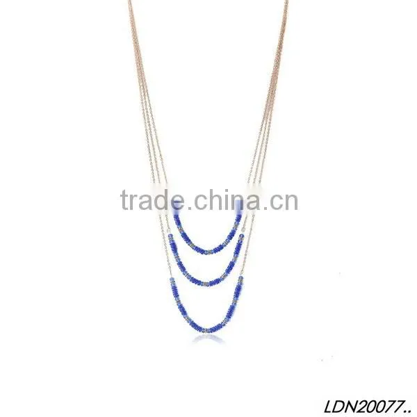 Blue triple resin pendant with matching earrings and bracelet necklace