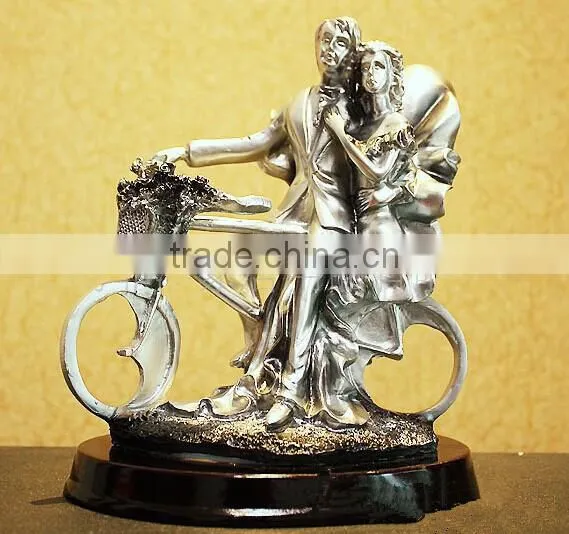 Resin craft couples dolphins, resin statues