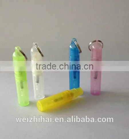 Small plastic empty perfume bottle