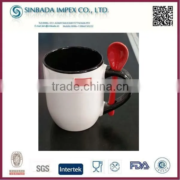 ceramic coffee mug with spoon