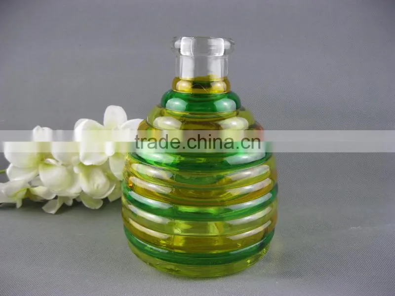 Hanging glass bee catcher with metal handle and wood cork stopper for home and garden use