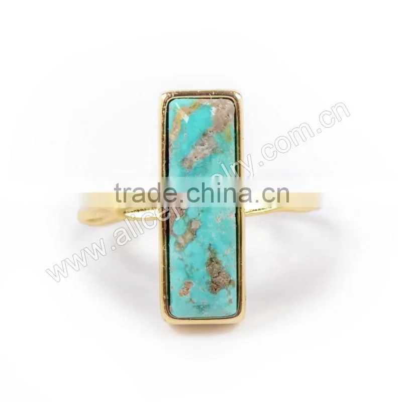 Natural blue turquoise set into a 18k gold bezel