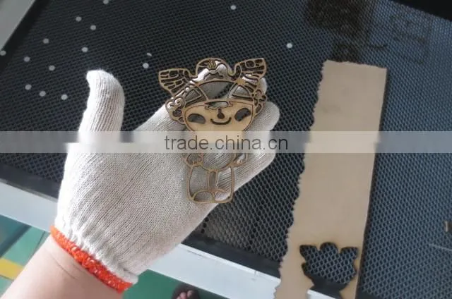 cheap beautiful design jinan Donglian laser cutting and engraving machine price for coconut shell