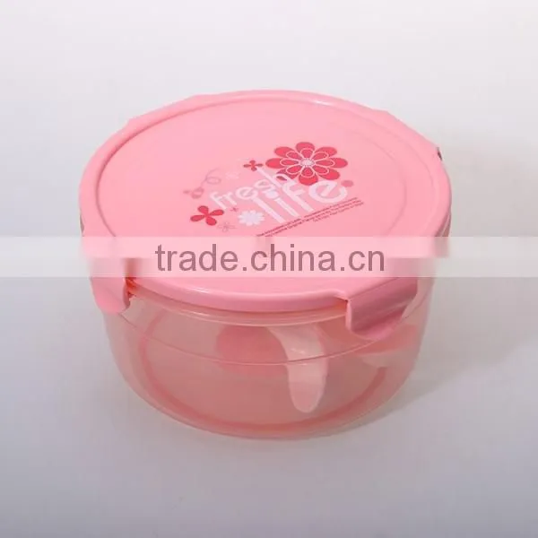 Household pink round four locked lunch box with spoon