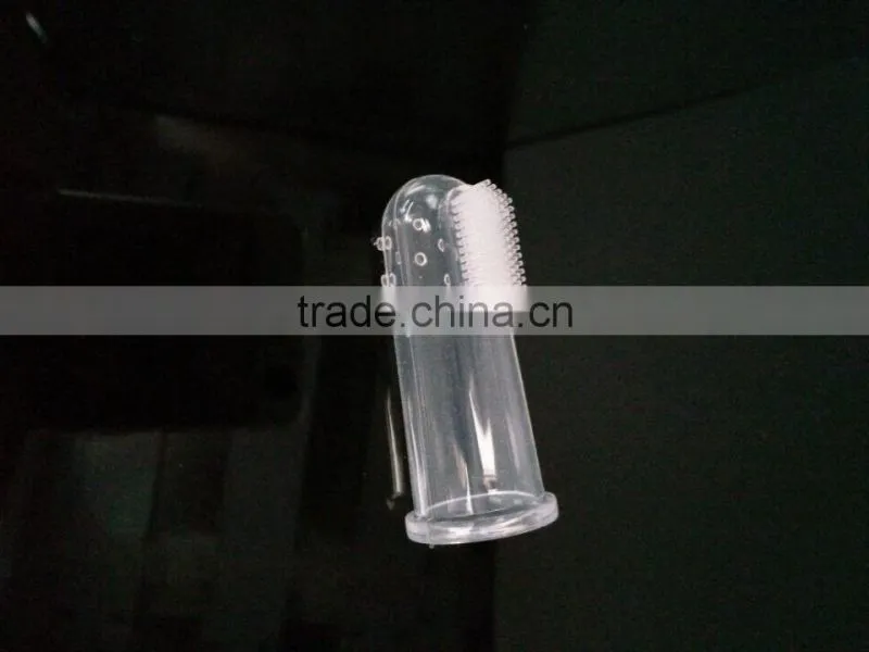 Best selling china travel toothbrush finger chewable rubber bristle clear silicone adult toothbrush