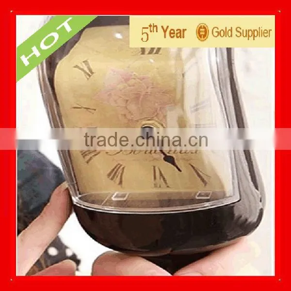 2013Popular Melting Bottle Clock supplier from china