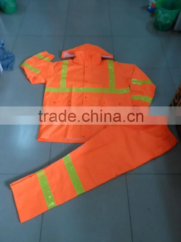 high visibility orange safety rainsuit with yellow plastic tapes
