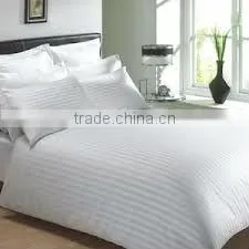 hotel bedding linen in white color