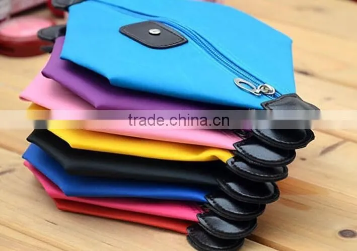 YIWU RODA 100%nylon multicolor optional dumpling shape cosmetic bag