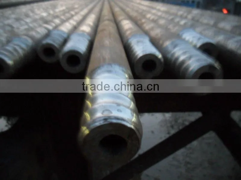 Blast furnace tap hole drilling rod and bits