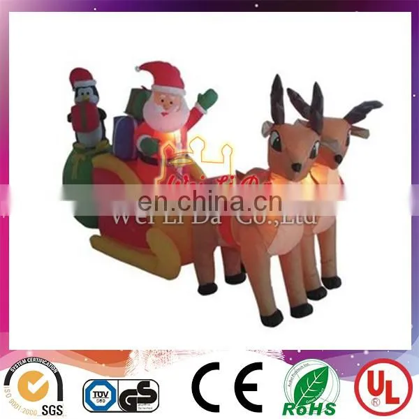 inflatable santa with sleigh and reindeer