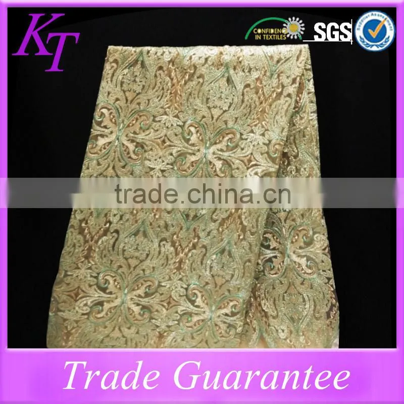 Wholesale special design embroidery gold lace fabric