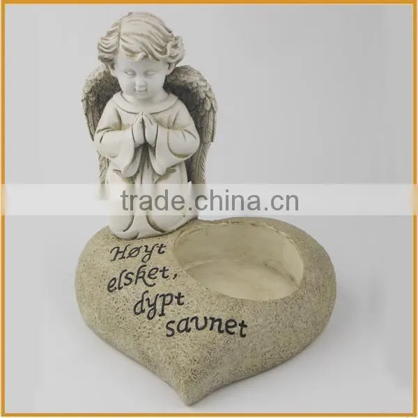 Resin angel with candle holder