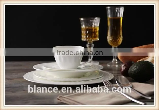 white ceramic European coffee cup set