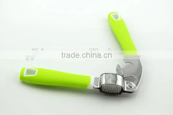 easy to use and clean stainless steel garlic press with soft handle