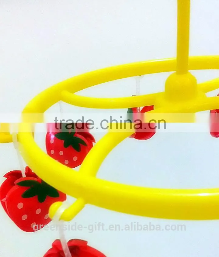 Durable plastic sock hanger with cartoon strawberry pegs
