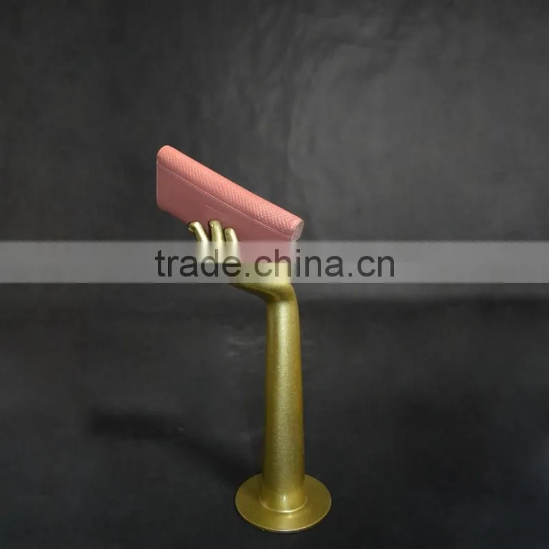 Fashion store display golden glossy merchandising mannequin hand
