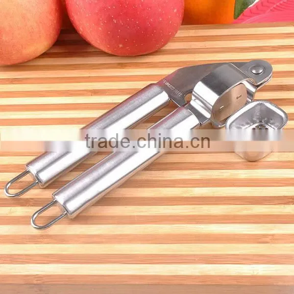 Amazon New food grade approved 100% stainless steel garlic press garlic press and peeler kitchen garlic peeler