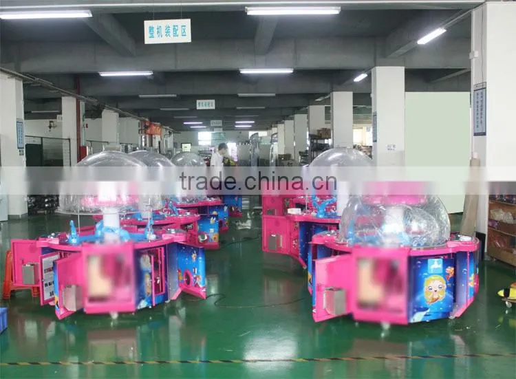 Toy claw machine rainbow paradise coin operated mini vending machine
