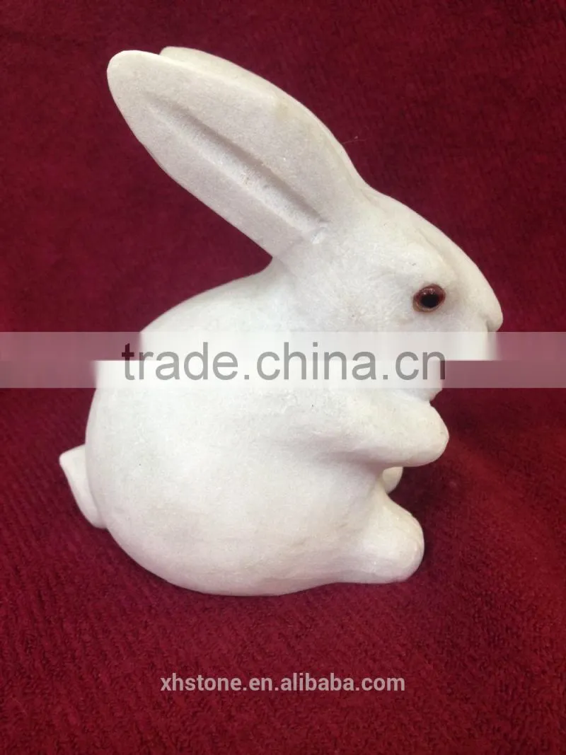 The small white rabbit stone statue,stone sculpture , stone craft