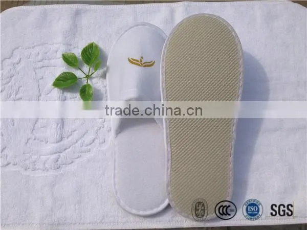 Wholesale soft hotel plush material slipper closed toe with EVA sole